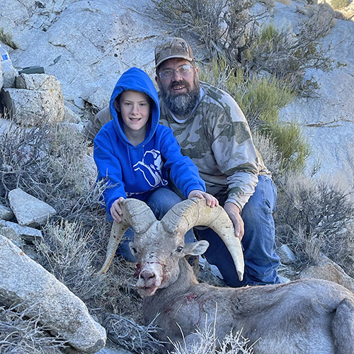 Mike Aiazzi with his son on a successful bighorn hunt